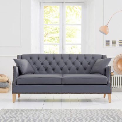 An Image of Kosmo 3 Seater Sofa In Grey Leather With Natural Ash Legs