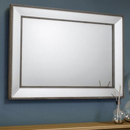 65c0fb551d5292f907fdf3e4a09b67f42768519b561b6c6248d2df0be6871f1e.jpg An Image of Symphony Beaded Wall Bedroom Mirror