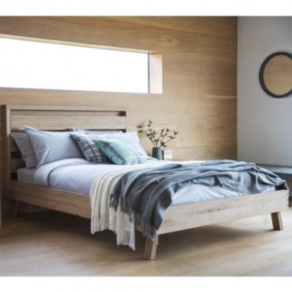 An Image of Kielder Mellow Solid Oak Double Bed In Light Oak