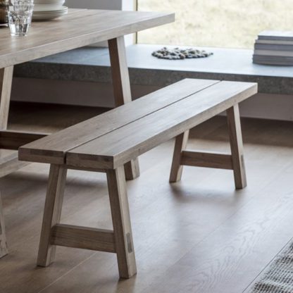 69ebea72538bf01195efed3eb00d353d4df4b904ea4424b4e58daadb6579cf64.jpg An Image of Kielder Wooden Dining Bench In Solid Oak