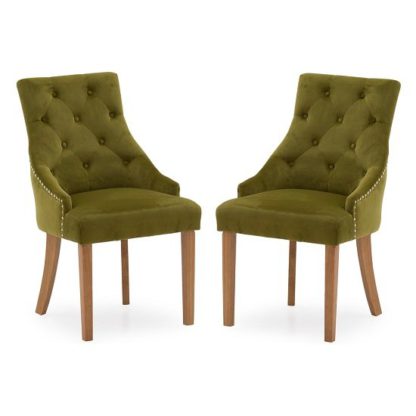 An Image of Vanille Velvet Dining Chair In Moss With Oak Legs In A Pair