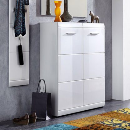 6bf34130ed1e6e9eb0a0d4d528092d643aa7068dbf88f9adc1e2ac331103210e.jpg An Image of Adrian Wall Mount Shoe Cabinet In White With High Gloss Fronts