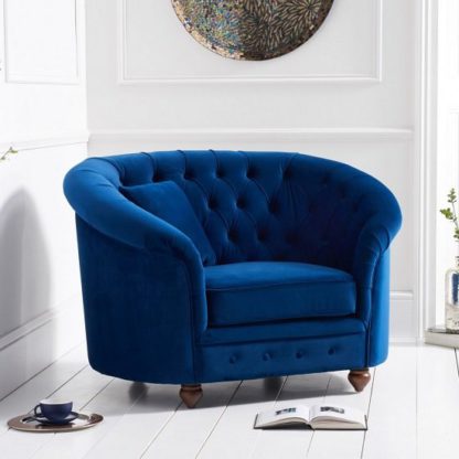 7045cf092b5db0ed6a039222ab983ead6dbc27bfda14c70eb70f1598c309ff87.jpg An Image of Astoria Sofa Chair In Blue Plush Fabric With Wooden Legs