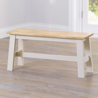 An Image of Antlia Wooden Small Dining Bench In Oak And Cream