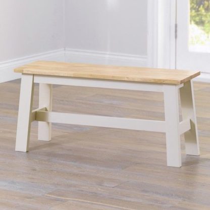 An Image of Antlia Wooden Small Dining Bench In Oak And Cream