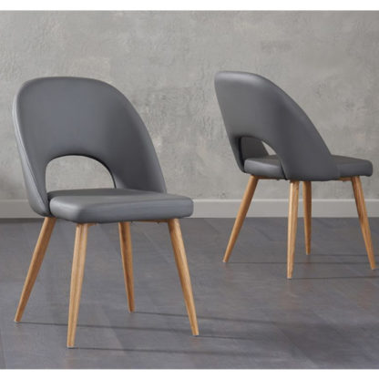An Image of Heze Grey Faux Leather Dining Chairs In Pair