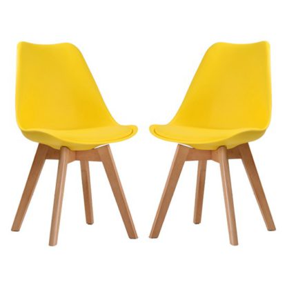 An Image of Louvre Yellow Finish Dining Chairs In Pair