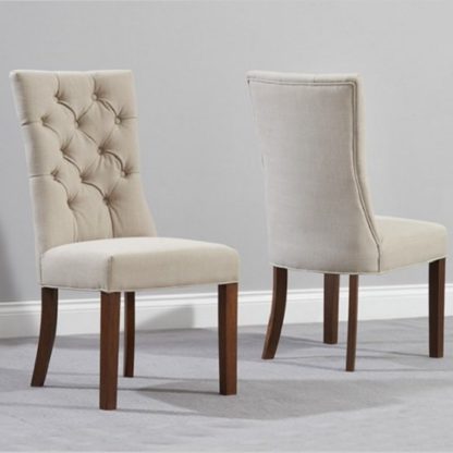 7b504a724ead676ba904e3ed949f0f26c21e1a3fdaedc04fd580a95fa18a8911.jpg An Image of Tetras Fabric Dining Chair In Beige And Dark Oak In A Pair
