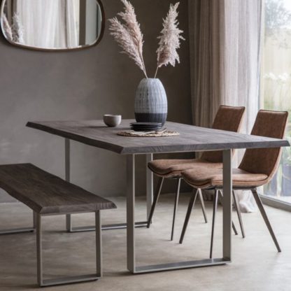7c993847cf7af985928f0147791831462fb6acf09860c42d4c10969f943011b0.jpg An Image of Huntington Wooden Dining Bench In Grey With Metal Stand