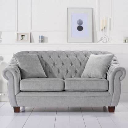 7cae2cb9352931e1616e4a95db82b247e522925b724fdd93c690b5e550442292.jpg An Image of Sylvan Chesterfield Style Fabric 2 Seater Sofa In Grey Plush