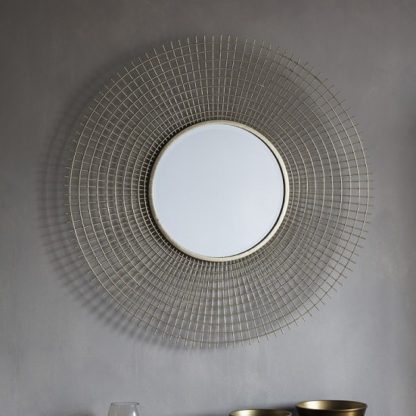 7ebf8babdce8cb5f11d19d5515880d9dd80d4c56986e86451f7718359b0828f9.jpg An Image of Antila Modern Wall Mirror Round In Gold