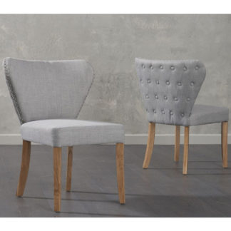 An Image of Nervia Grey Fabric Dining Chairs In Pair