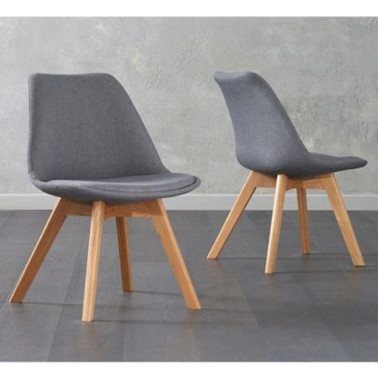 An Image of Brachium Dark Grey Fabric Dining Chairs In Pair