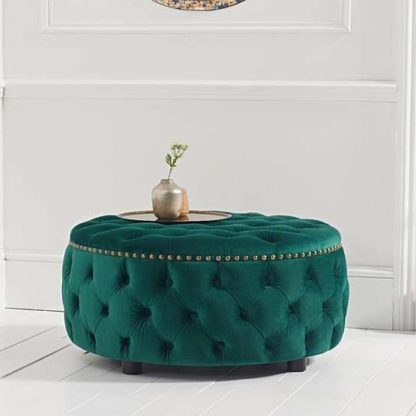 7ffe9dbfad9c14c986ee99389571f3f01063f0d4f89fd53639ca5827d48c1df2.jpg An Image of Aniara Velvet Round Footstool In Green
