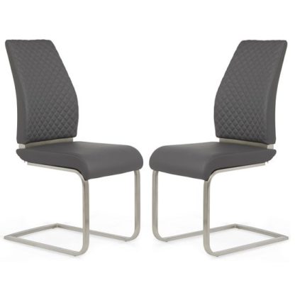 803e47cafca8b66a7cab54a946b809291beb2fede89cb63a0bf351745a94f96c.jpg An Image of Adene Dining Chair In Grey Faux Leather In A Pair