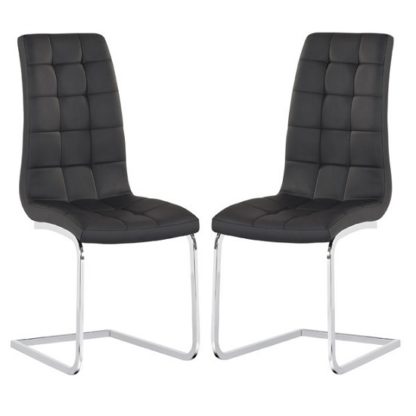 824c4a862d8957e32b4d5f189c29925b532f38a6cda2718868c161ce1d26416d.jpg An Image of Torres Dining Chair In Black Faux Leather in A Pair