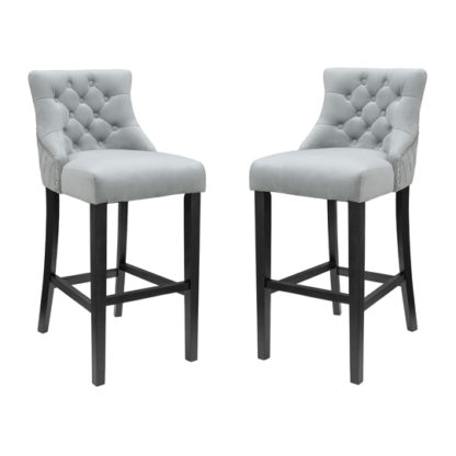 82780f3df675cde844bdc834352f210e59331addf8cacc05fb2ea999d974d651.jpg An Image of Victoria Grey Velvet Bar Stool In Pair