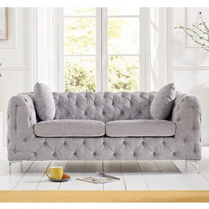 832b4c796fa40344961bcc2a025de607fe1f591e98da80b14a6b850ed19d3e5e.jpg An Image of Sabine Velvet Two Seater Plush Sofa In Grey With Metal Legs