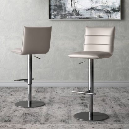 8367eb967bac429fa3220b31f9077fe9be6417bc39738abc54546291e6436851.jpg An Image of Riva Taupe Faux Leather Bar Stools In Pair