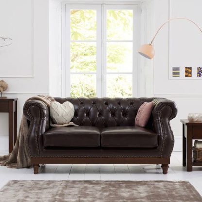 An Image of Ruskin 2 Seater Sofa In Brown Leather With Dark Ash Legs