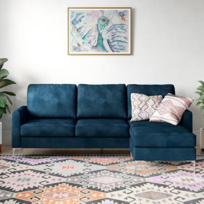 8d4473fc9368ddd223e8488defec0d5329ecb7d85902027016af578fec5b1e73.jpg An Image of Chapman Velvet Corner Sofa In Blue with Chrome Legs