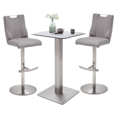 8fcca00be721092f51646fe2362fc8aac1cdd75754c88ade60e1abad8770d47b.jpg An Image of Soho Glass Bar Table With 2 Jiulia Ice Grey Leather Stools