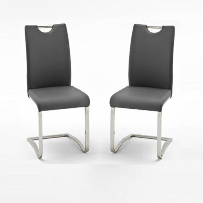 90244707c71ab07d07788c00e899eb7a675ddfa813df29778dcbf64e906f407b.jpg An Image of Koln Dining Chair In Grey Faux Leather in A Pair