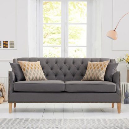 9305d84fee83d2c86d09a69633d159f173f918afd2042593a316cf1a073642ef.jpg An Image of Kosmo 3 Seater Sofa In Grey Fabric With Natural Ash Legs