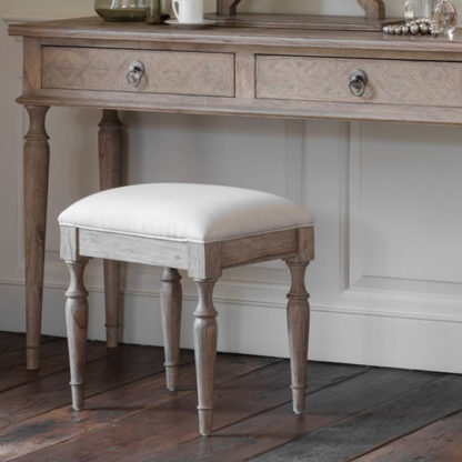 931c2e5d9896eedcaf2a87123aa979ad781cb8d62fb3a87e7249f135e6d4913e.jpg An Image of Mustique Mindy Ash Wooden Dressing Stool