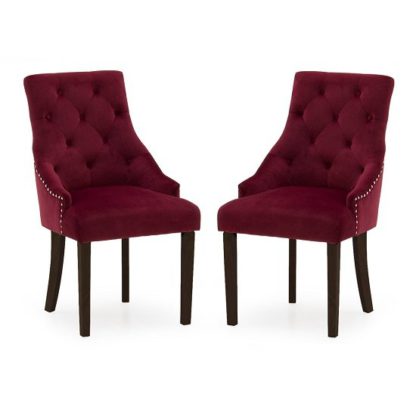 940822f741cdcc1cf33a11684a5dc225b333ee9e36a3781f44818d37c996b694.jpg An Image of Vanille Velvet Dining Chair In Crimson With Wenge Legs In A Pair