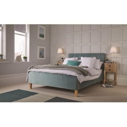 An Image of Marciel Fabric King Size Bed In Aqua Velvet With Wooden Legs