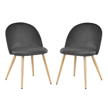 9c4abb97bd5ff775e36309d469c03067e890e28c971fdc7c7199fb652bd22728.jpg An Image of Swart Velvet Dining Chairs In Grey With Oak Legs In A Pair