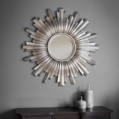 9ffff1431efeb1541ac28ed087215c26fa6911f40537ddbc922f74a17859422d.jpg An Image of Safari Decorative Wall Mirror Round In Silver