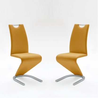 a0280745413e44c921e4a050847c69cfddcbabaa9435006719a77e78b93fd1a3.jpg An Image of Amado Dining Chair In Curry Faux Leather In A Pair