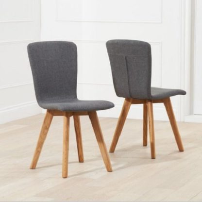An Image of Javelin Dining Chairs In Charcoal Grey Fabric In A Pair