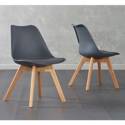An Image of Brachium Dark Grey Faux Leather Dining Chairs In Pair