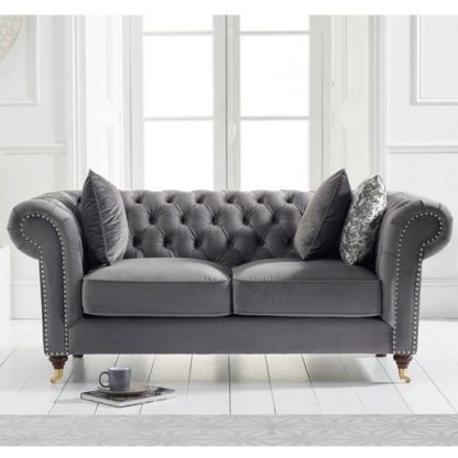 a19b4706bde95b762fe2e98e17a17fe4fa97a4e888ce899581a4d06fc5e1b61f.jpg An Image of Holbrook Chesterfield 2 Seater Sofa In Grey Velvet