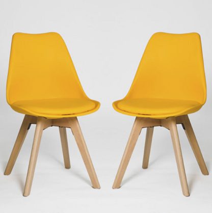 a267388a0837fc4ad5eb206fa4acc0ca5c89dc7627282511414ae359a6525bfb.jpg An Image of Regis Dining Chair In Yellow With Wooden Legs In A Pair