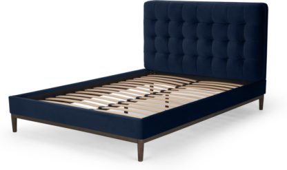 a7948ec20deffe5cc103bd188bba6a7bd0e88a2d47b5cf4bbb2ac1544594f498.jpg An Image of Lavelle Super King Size Bed, Ink Blue Velvet & Walnut Stain Legs