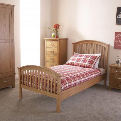 ac5ac327aece92c0ad80f62ffe986b5b9027d32b9929b5b1623317cd0a4fd13d.jpg An Image of Madrid Rubberwood Single Bed In Natural Oak