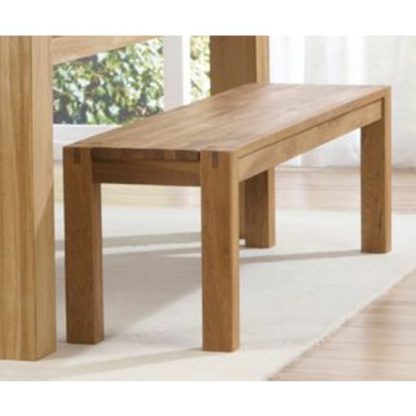 acaaef6016bef338cf7788aa76c3982a66b73686c42b502675da0fdea2417397.jpg An Image of Skat Wooden Dining Bench In Oak