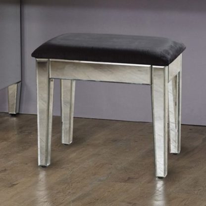 acd07dacbf6999431c67ae9b87f81f2526b84b30a862f891b38cbc22124fe89b.jpg An Image of Marnie Mirrored Dressing Table With Black Cushioned Seat
