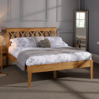 An Image of Autumn Hevea Wooden Small Double Bed In Honey Oak