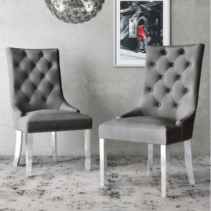 b1e914bbf2379da671ec8ae8607af26e53f089bcc09871a3bd454d4570bf727a.jpg An Image of Donatello Dark Grey Velvet Fabric Dining Chairs In Pair