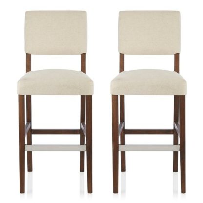 b40fb8568b9c5e1d3d23a78417d6b045e44c8a5124494d3fe4872eba22c8f571.jpg An Image of Vibio Bar Stools In Cream Fabric With Walnut Legs In A Pair