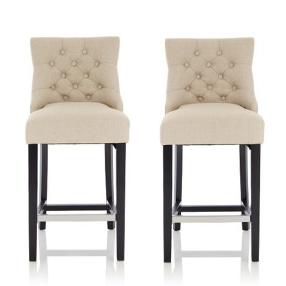 b6d92fcacdbd95307e4c11617675197d7e7d68302d6cf218a4e26ef1e4d3977a.jpg An Image of Calvia Bar Stools In Linen Fabric With Black Legs In A Pair