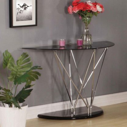 ba97b734720f7d07bdfa69887fc5e17441d6d6456f78f73837a0b193d27f1ccf.jpg An Image of Toulouse Console Table In Black Glass And Chrome Legs