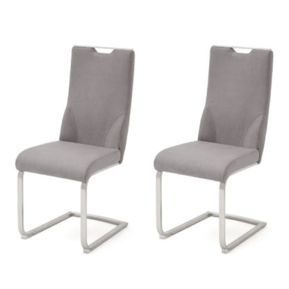 bc05ed77130534e7973c8ad0106557bfc8ba1ac2453b331086577f9cc2b55343.jpg An Image of Jiulia Ice Grey Leather Cantilever Dining Chair In A Pair
