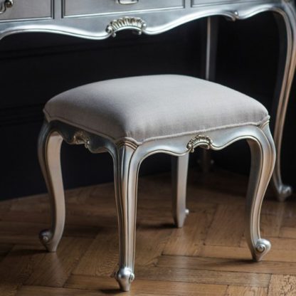 bdccfdc88d85a2197b60c55a5c76756c7dc3d055866b36e16e5fddc87f11a3a9.jpg An Image of Chic Dressing Stool In Silver With Cotton Seat