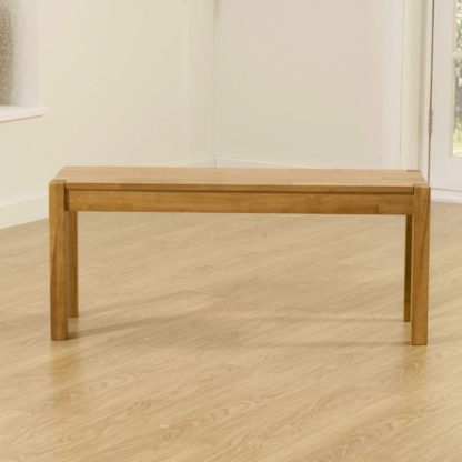 An Image of Elnath Medium Dining Bench In Solid Oak